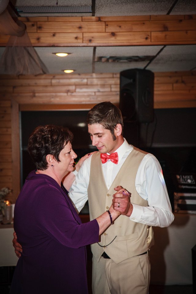 Mother and groom dance